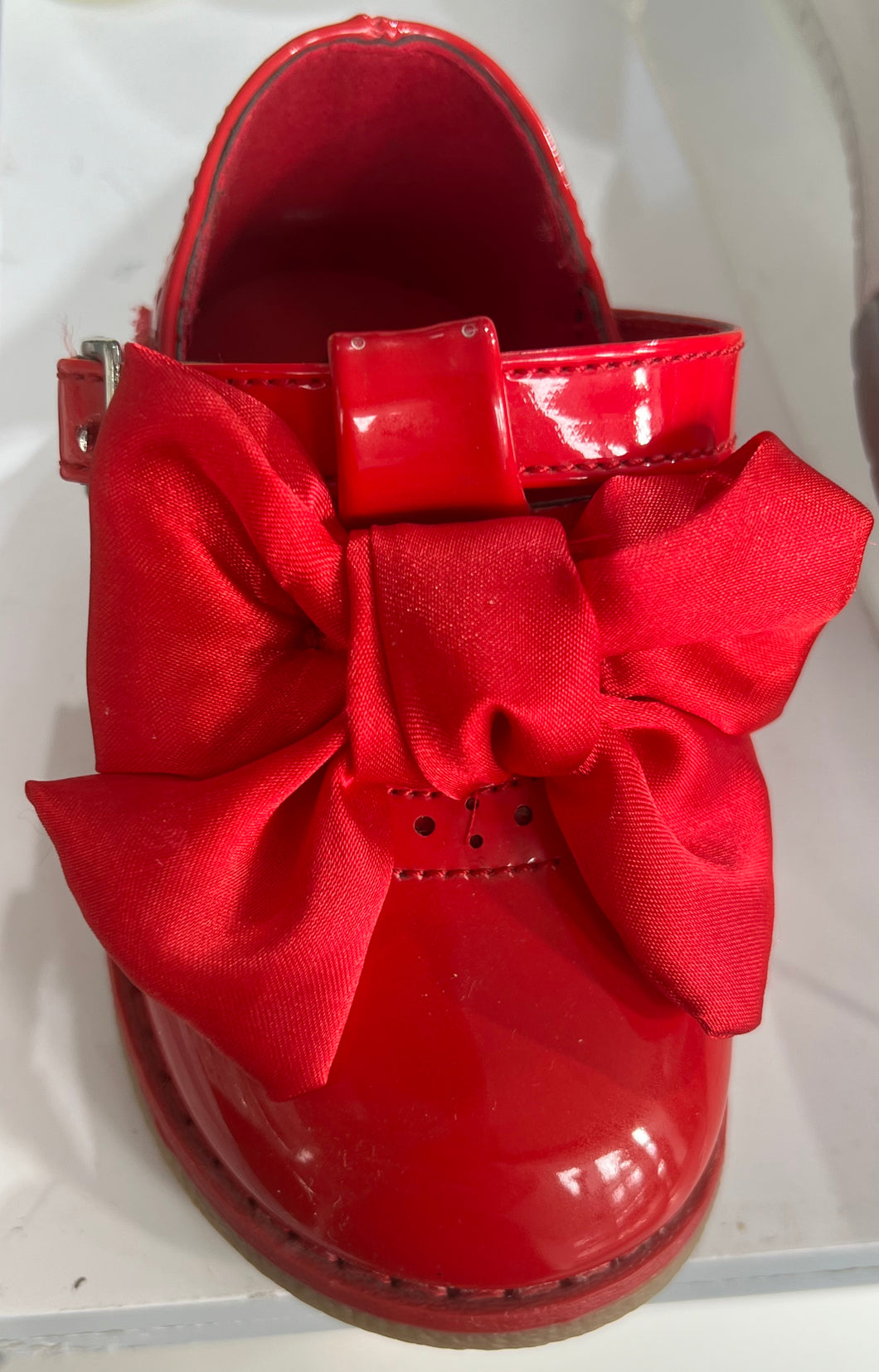 Red shoes with bow