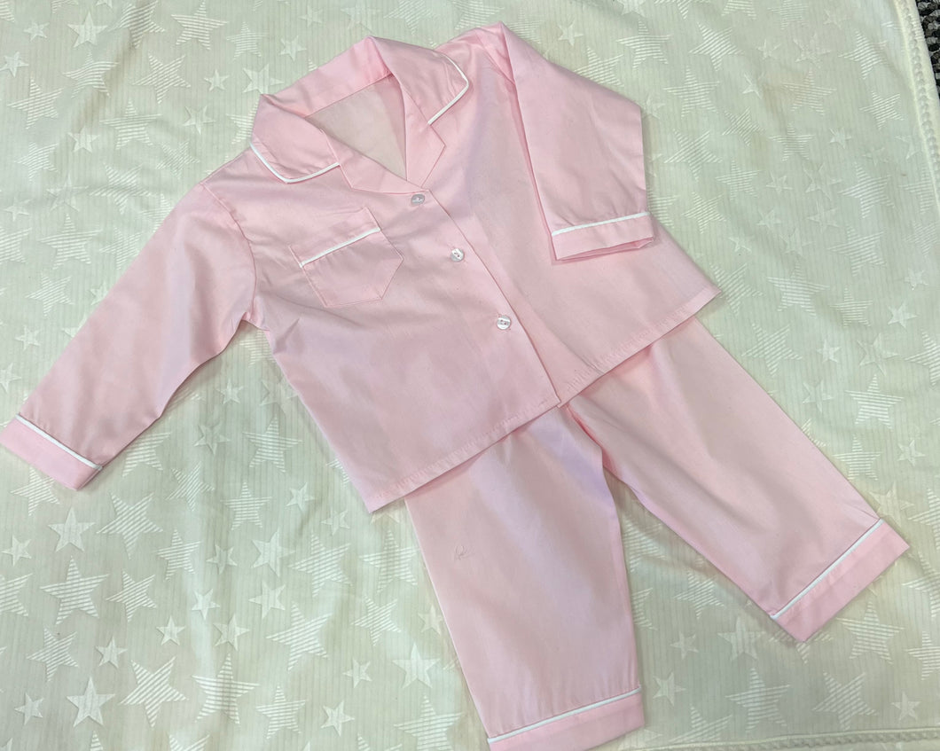 Pink pyjamas can be personalised