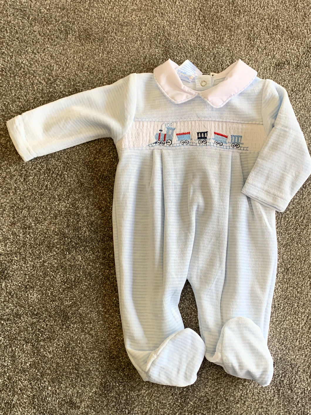 Velour smocked train baby gro